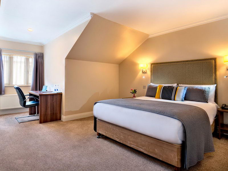Executive bedroom at Sandymount Hotel. Dublin with desk and double bed