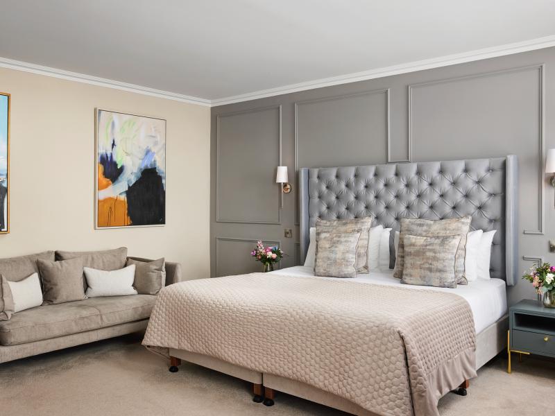 Executive bedroom at The Sandymount Hotel. Dublin with desk and double bed